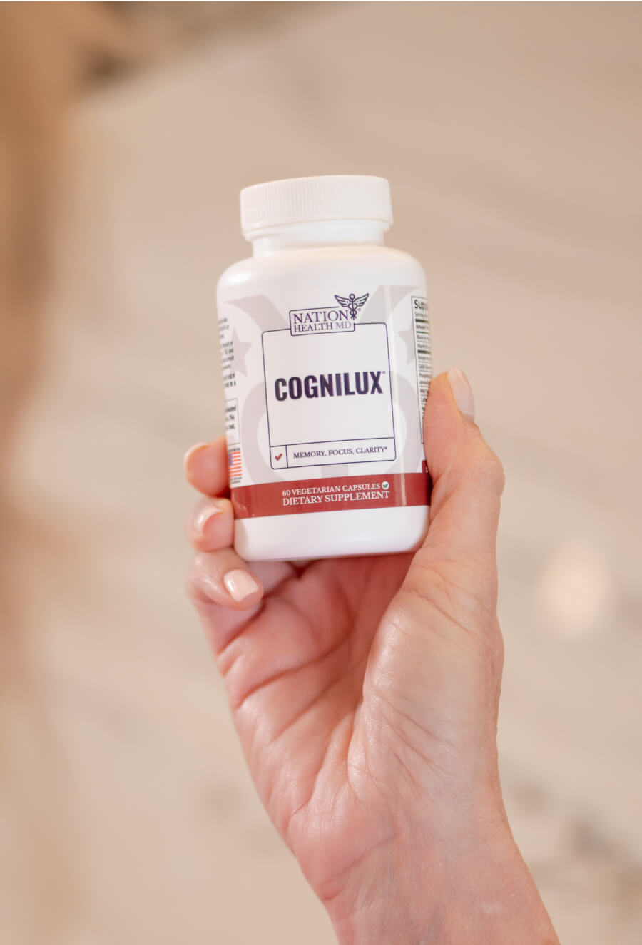 cognilux bottle in hand